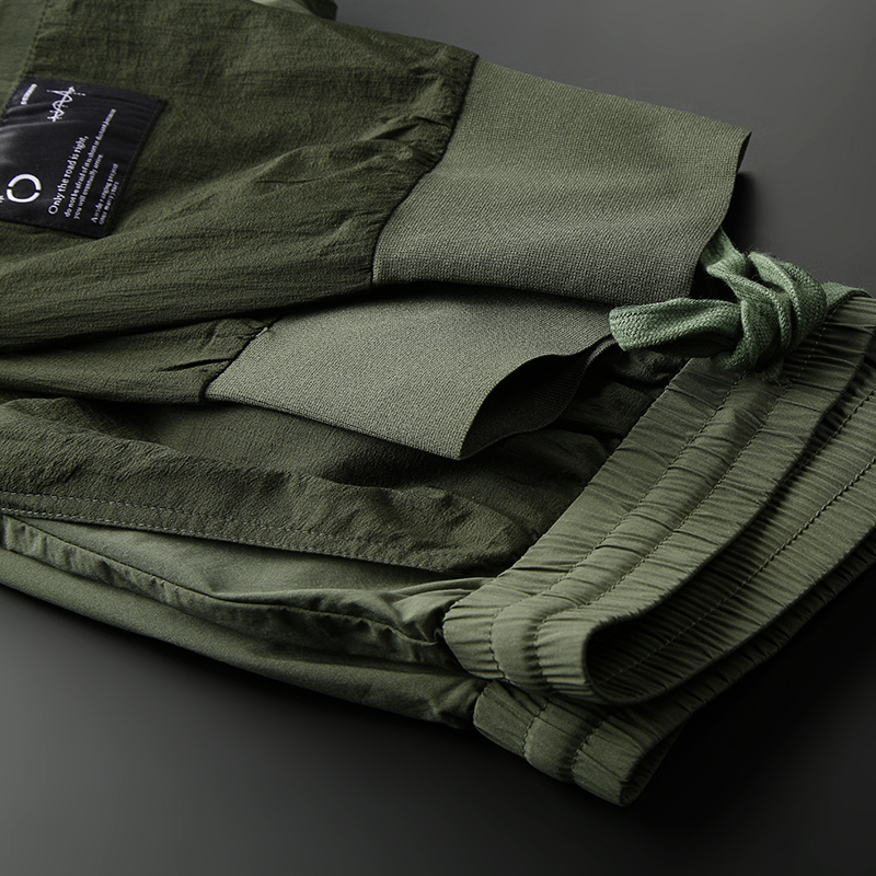 古鼎原创 设计感拼接军绿色休闲裤子男士夏季潮牌韩版抽绳束脚裤