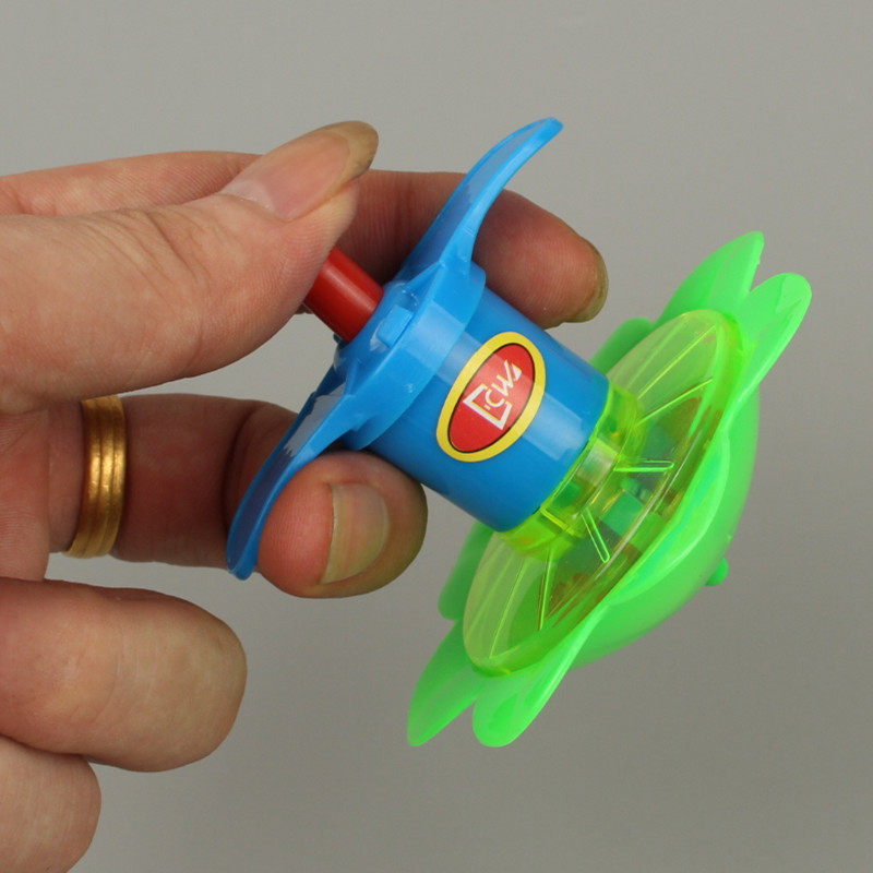 陀螺儿童发光玩具旋转七彩弹射发射器小学生奖品发光玩具