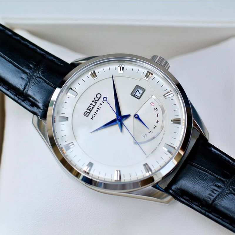 逆跳蓝针Seiko精工Kinetic人工动能背透机械防水皮带男手表srn071