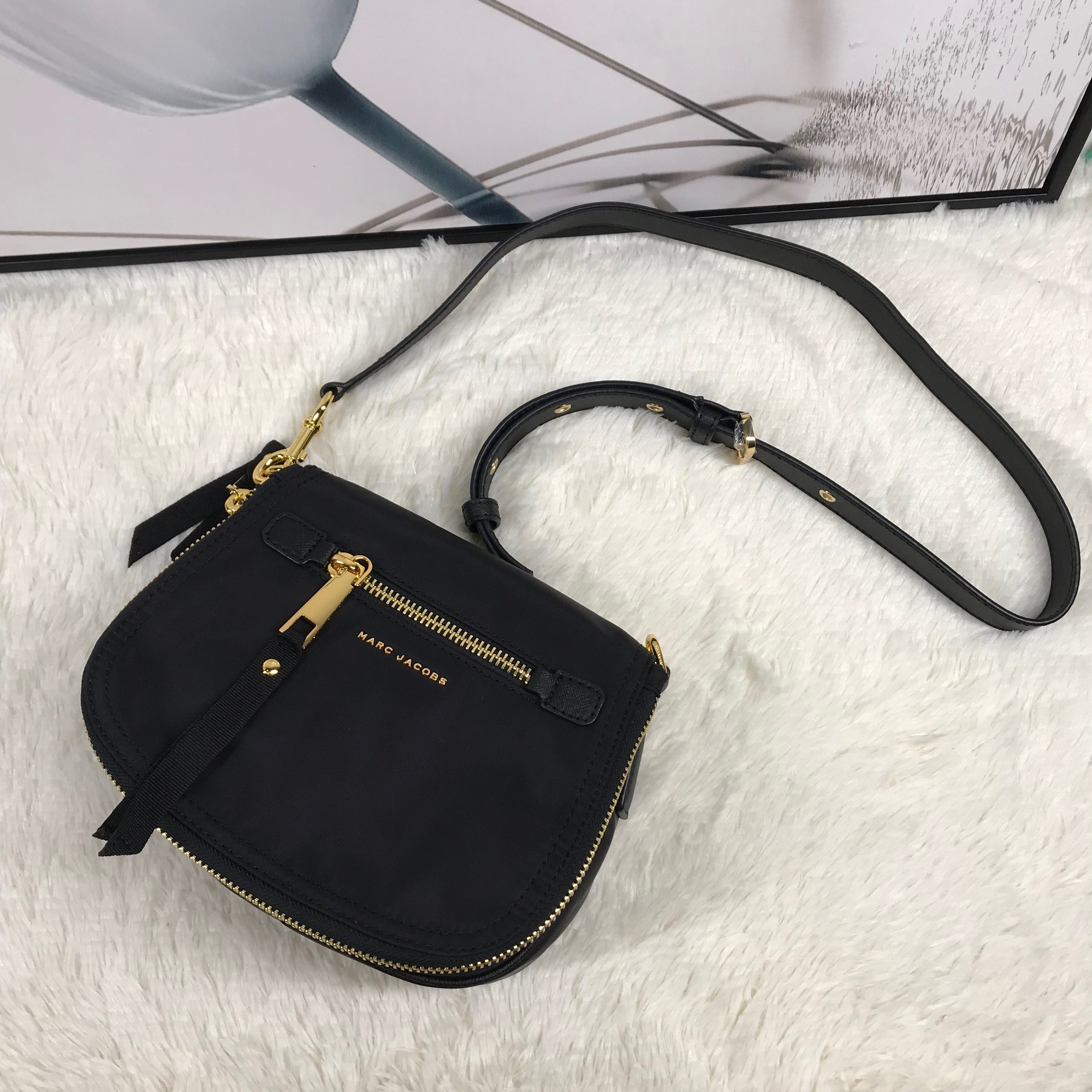 mj新款相机包女挂包防水搭扣小马哥单肩背包马鞍包