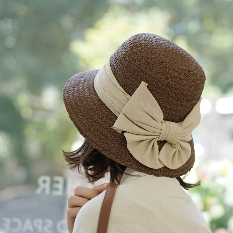 包邮精品拉菲草日式简约大蝴蝶结圆顶优雅遮阳草帽女春夏百搭帽子
