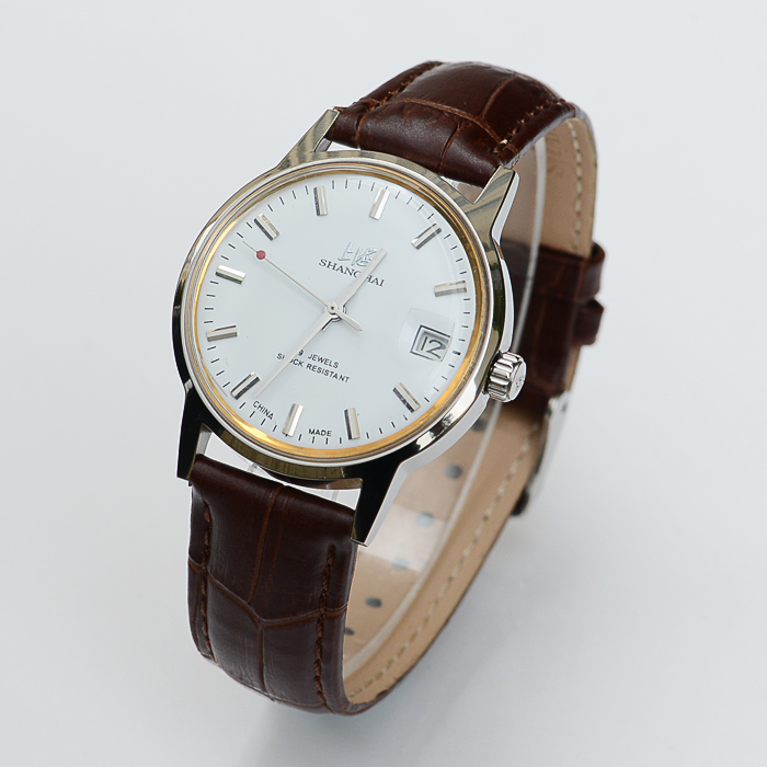 上海库存70年代老款博型搭配日历男皮带手动机19钻械表
