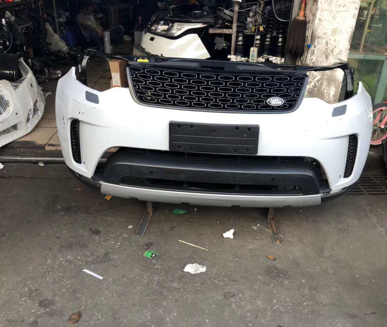 路虎运动板机叶子前杠总成前嘴揽胜发现极光保险杠