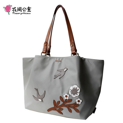花间公主燕子2022春夏新刺绣原创拼接撞色文艺手提包尼龙单肩女包