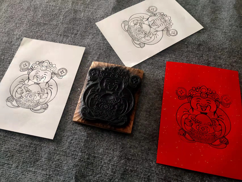 年画雕版梁公馆公馆木板财神拓印体验课堂非遗年画
