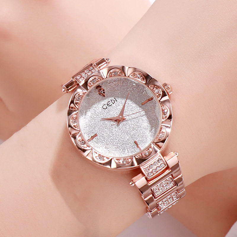 歌迪新款镶钻防水钢带女表网红大气轻奢满天星国产腕表