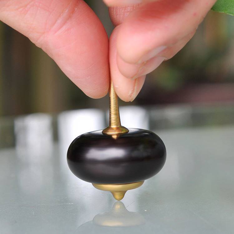 陀螺犀兮铜木手捻黄铜指尖实木金属紫檀手指陀螺