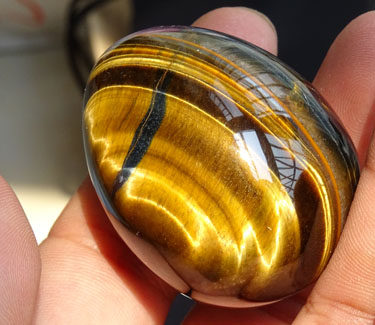 虎眼石千蕊天然鸡蛋把玩手把虎睛石原石摆件实物摆件