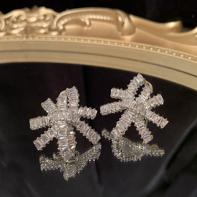 铜镶锆石丝带雪花耳环超闪镂空s925银针气质耳环