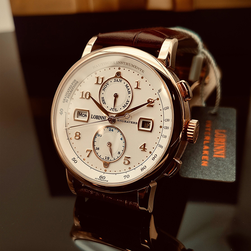 罗宾尼男士手表男机械表全自动商务多功能防水真皮带品牌正品十大
