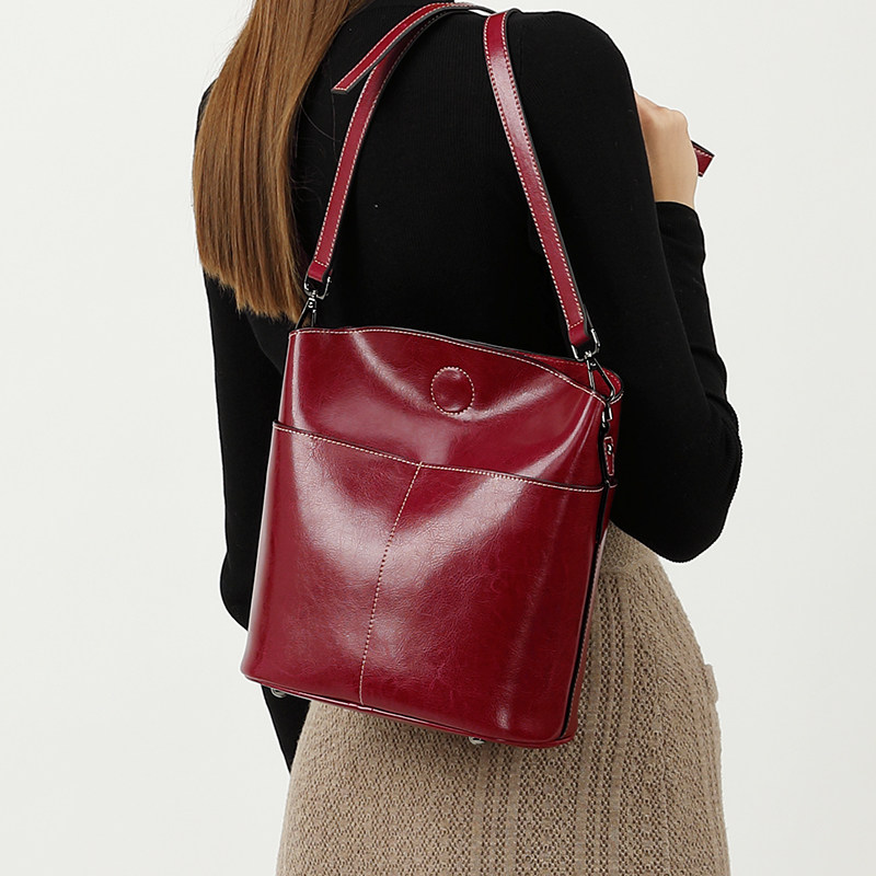 kimo包单肩牛皮斜挎单肩水桶包包女大容量百搭春夏水桶包