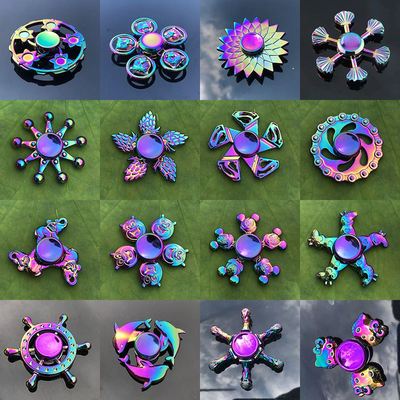 陀螺指尖女生可爱儿童炫彩彩色发光手上转动陀螺