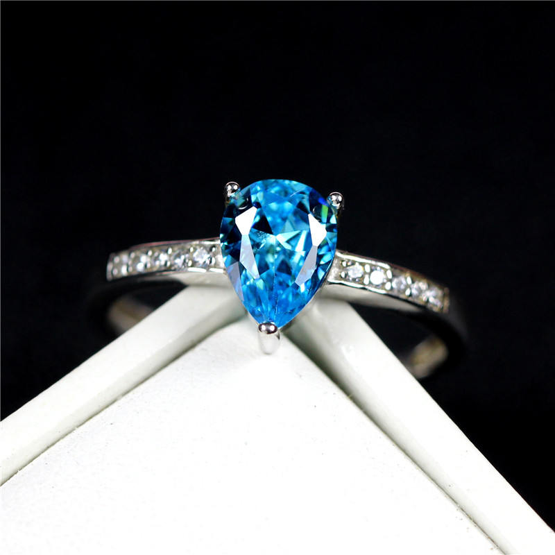 水滴海蓝宝戒指食指纯银镶钻个性1克拉天蓝色宝石戒指