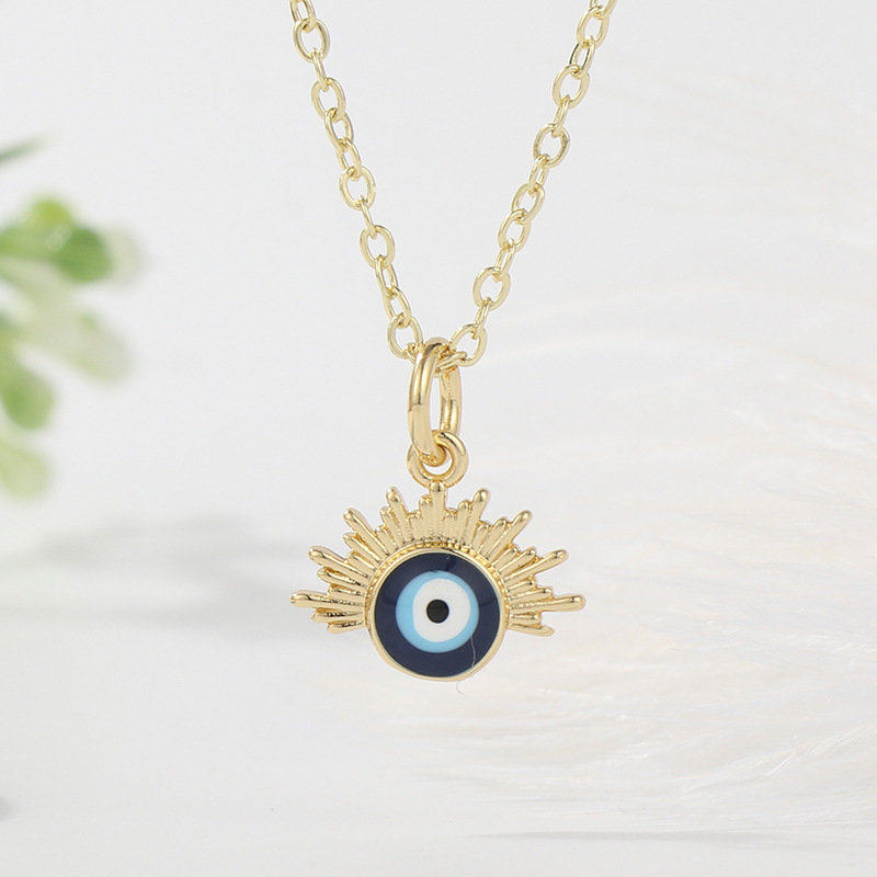 瑟嘞欧美跨境时尚镀金恶魔之眼滴吊坠不规则蓝眼睛项链