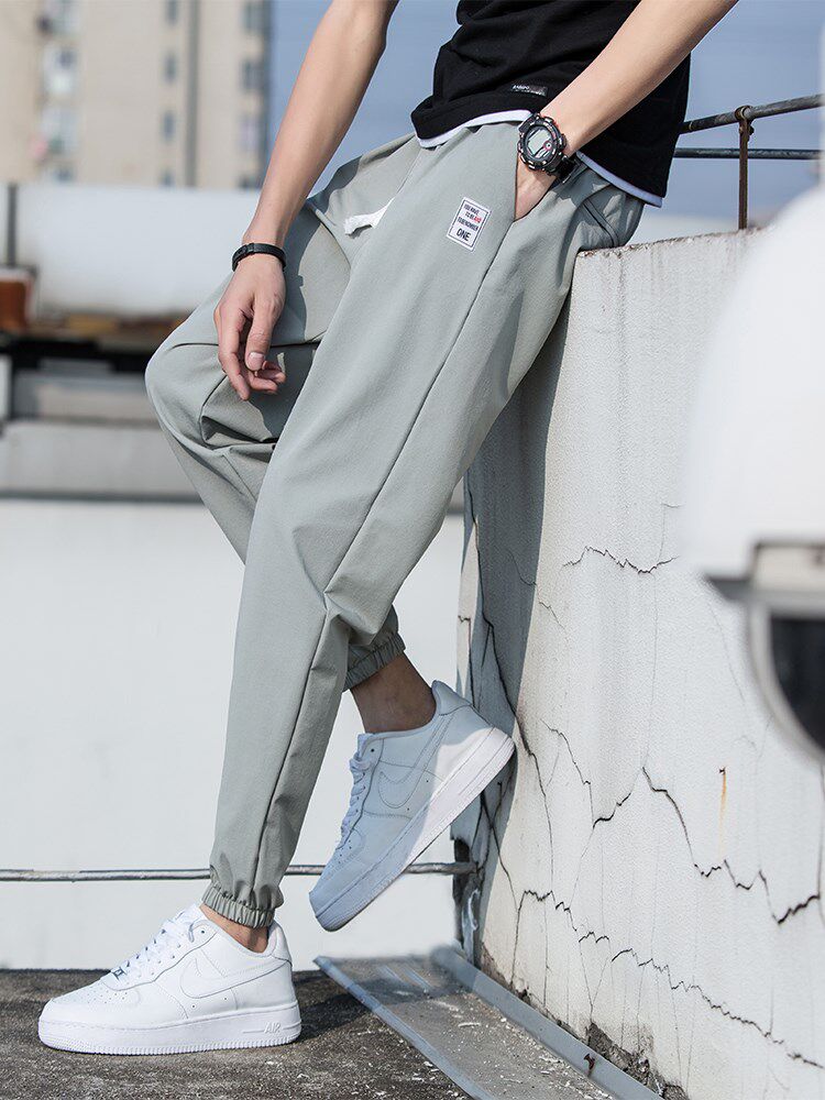 男士春天裤子港风百搭宽松束脚学生春季8分休闲裤