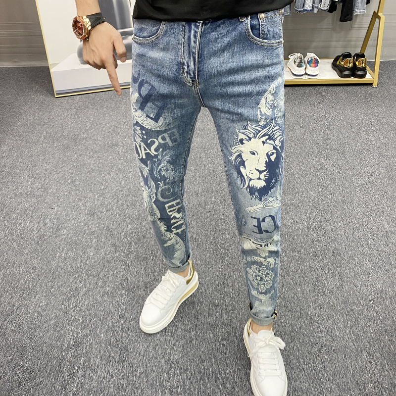 欧货潮牌霸气狮子字母不规则印花小脚牛仔裤男浅蓝色水洗四季百搭