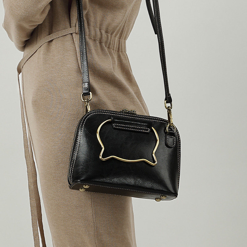 kimo小包包女2019新款简约潮春夏百搭斜挎猫咪手提单肩牛皮女包