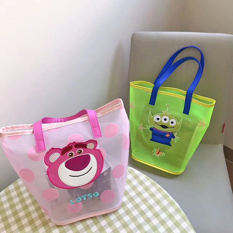 名创miniso网纱刺绣单肩女包草莓熊三眼仔透明立体卡通超轻购物袋 - 