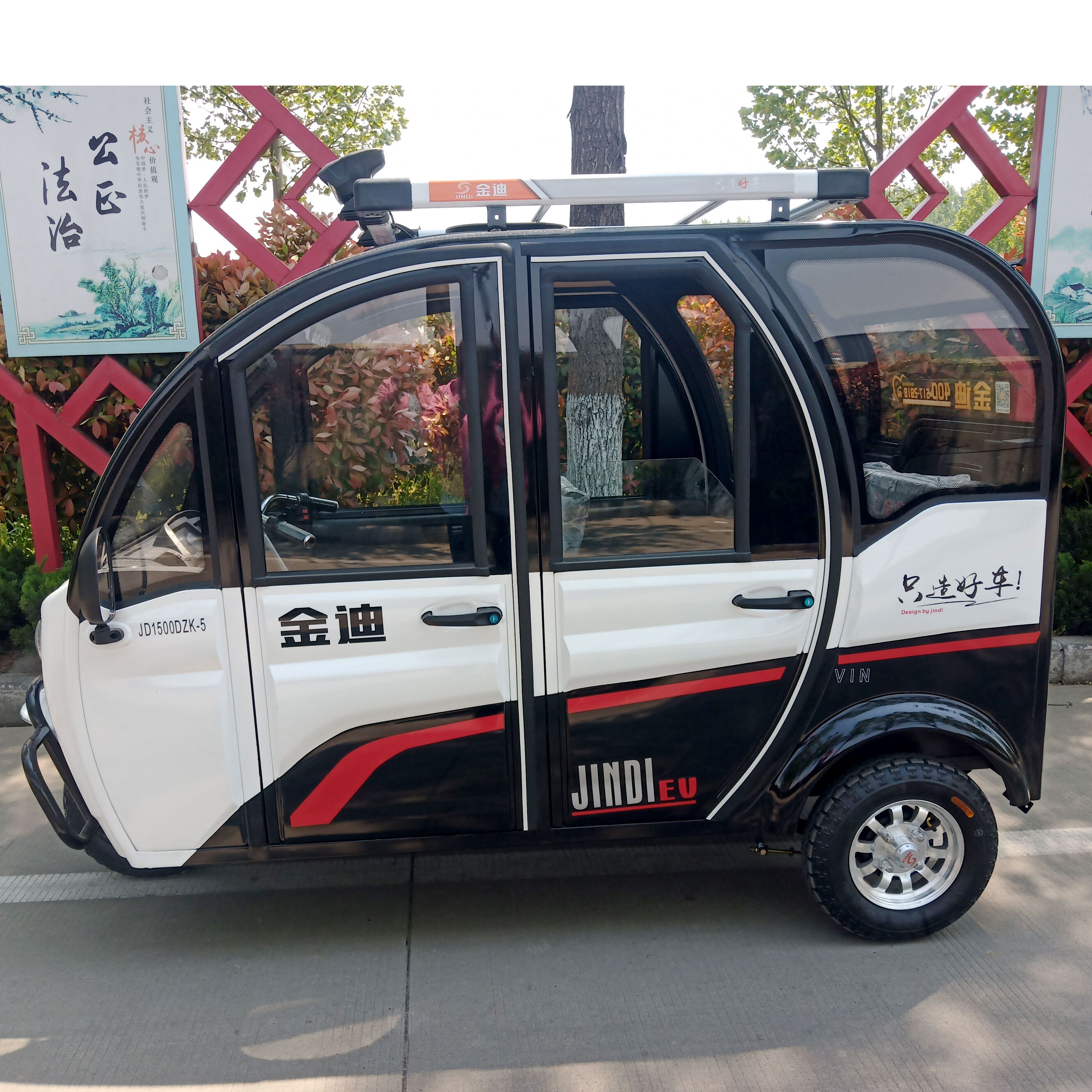 金迪全封闭电动三轮车成人家用新款小女性老人接送孩子带蓬电瓶车