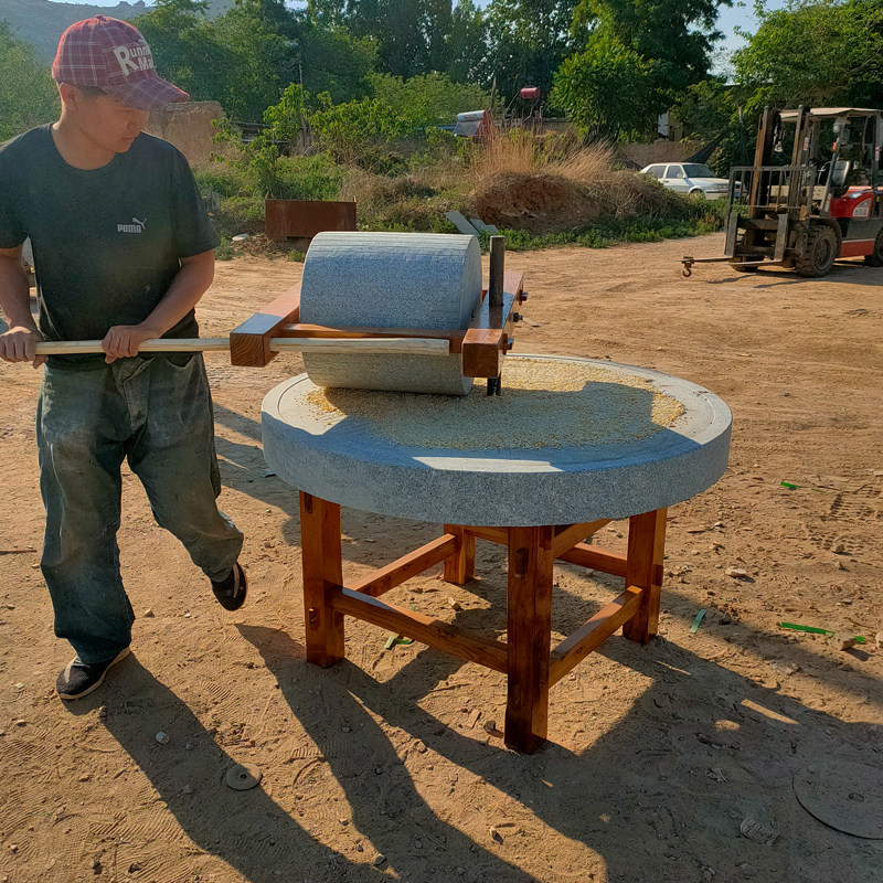 石碾子碾盘手推幼儿园公园怀旧复古石碾盘粮食磨面石雕
