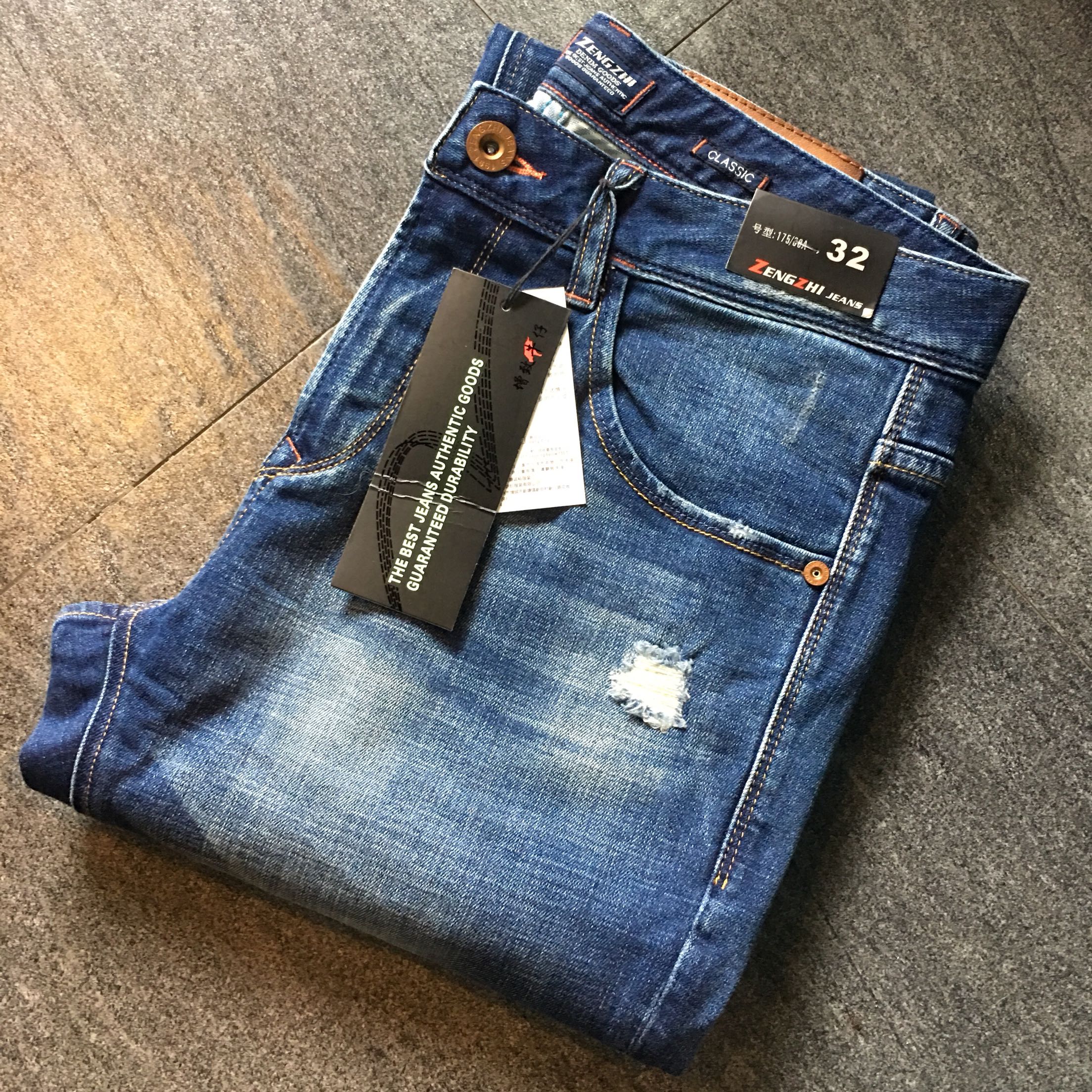 增致牛仔裤男2020新春款青年时尚破洞男装弹力牛仔小直筒裤