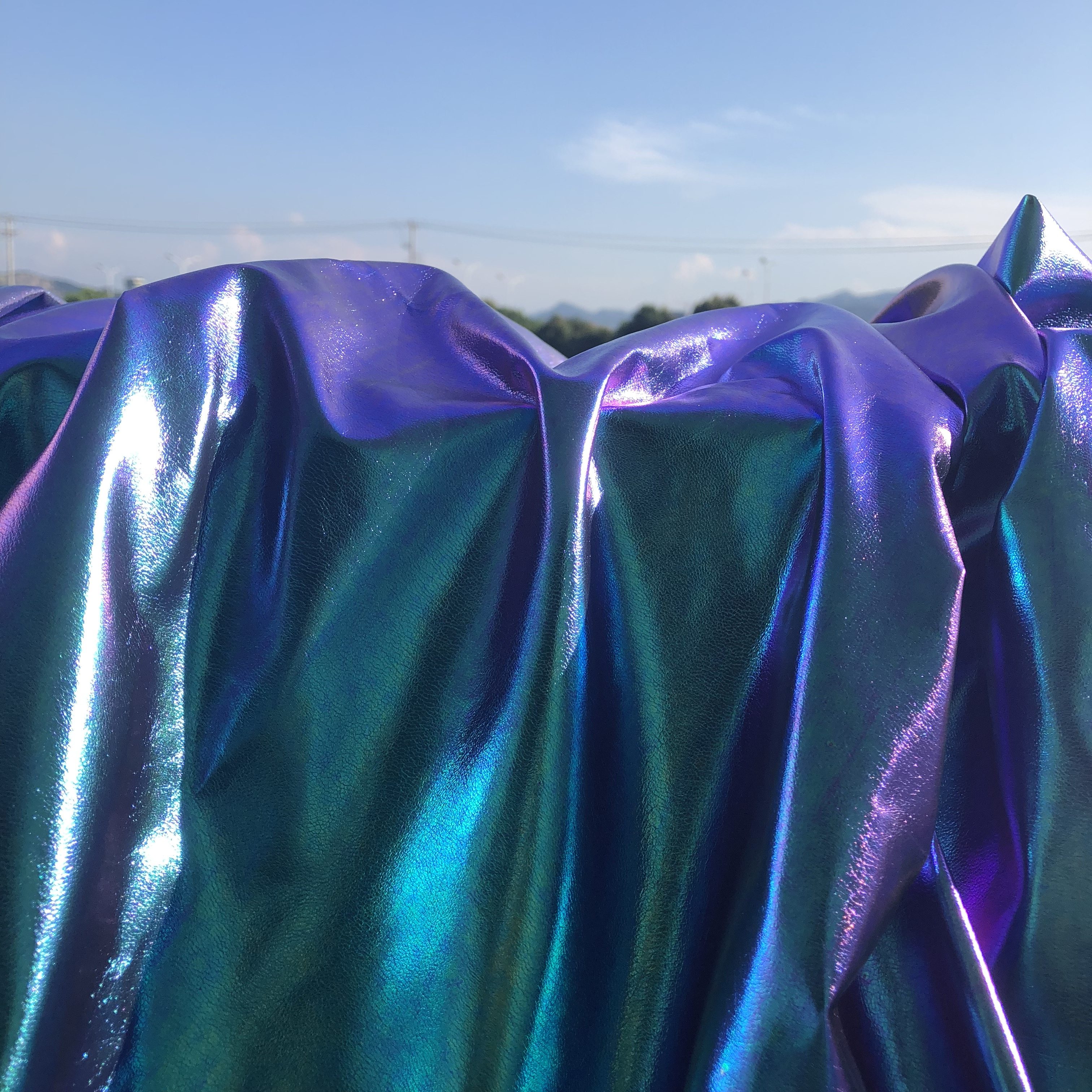 印象tpu镭射幻彩蓝紫原创设计师面料春秋秋冬海绵垫