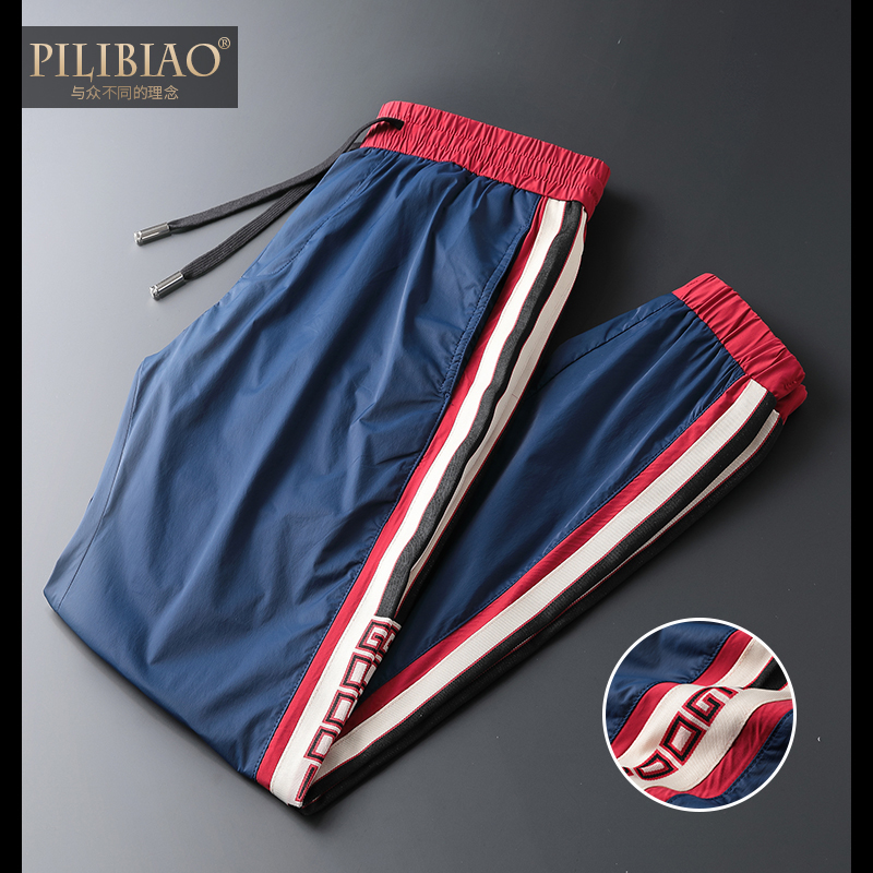 欧洲站轻奢男装冰丝面料夏季轻薄款潮流拼接九分休闲裤修身束脚裤