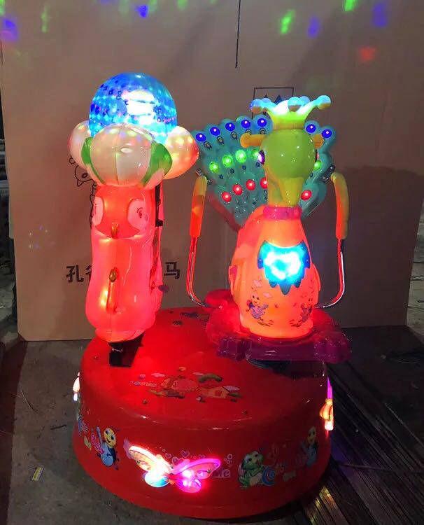 2021新款投币旋转摇摇摇车孔雀摇摆机儿童商用摇摆机