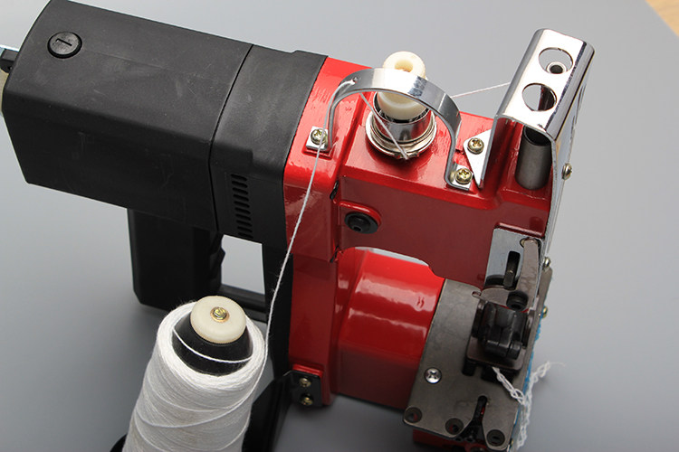 飞人gk9013b枪式手提电动包机封包机米编织编织袋缝纫机