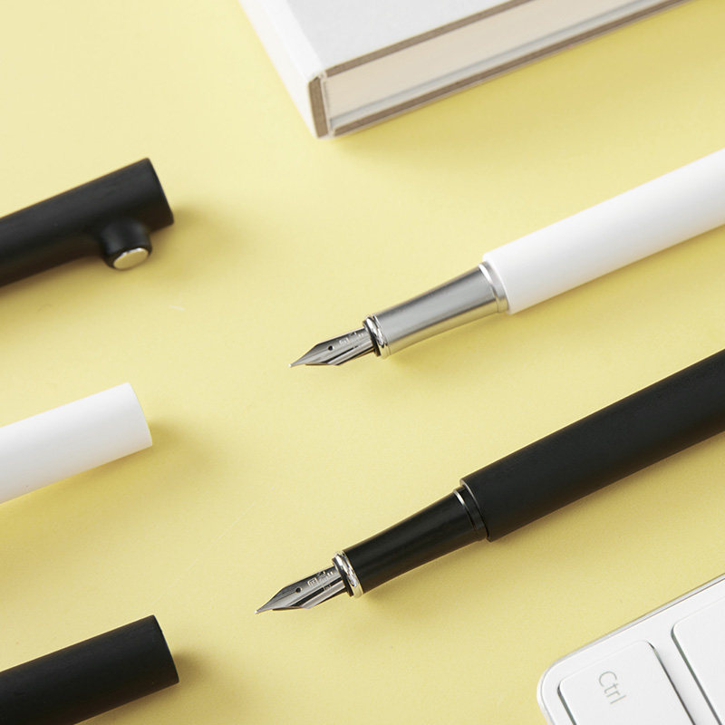 淘宝心选树枝磁铁钢笔红点奖大师设计师款练字送礼商务办公学生黑白