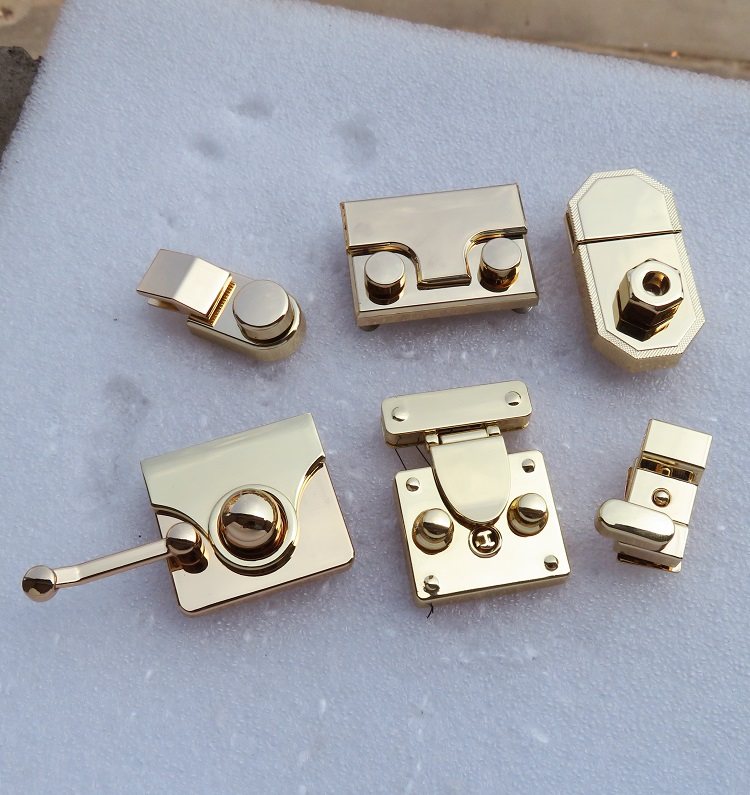 男女箱包箭头活页按钮锁竖款弹簧旋转皮具五金配件拎环