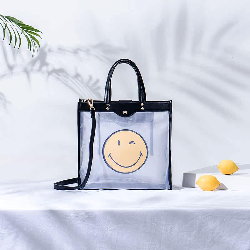2018夏季新韩版潮流单肩手提斜挎女士大包时尚网纱透明安雅笑脸包