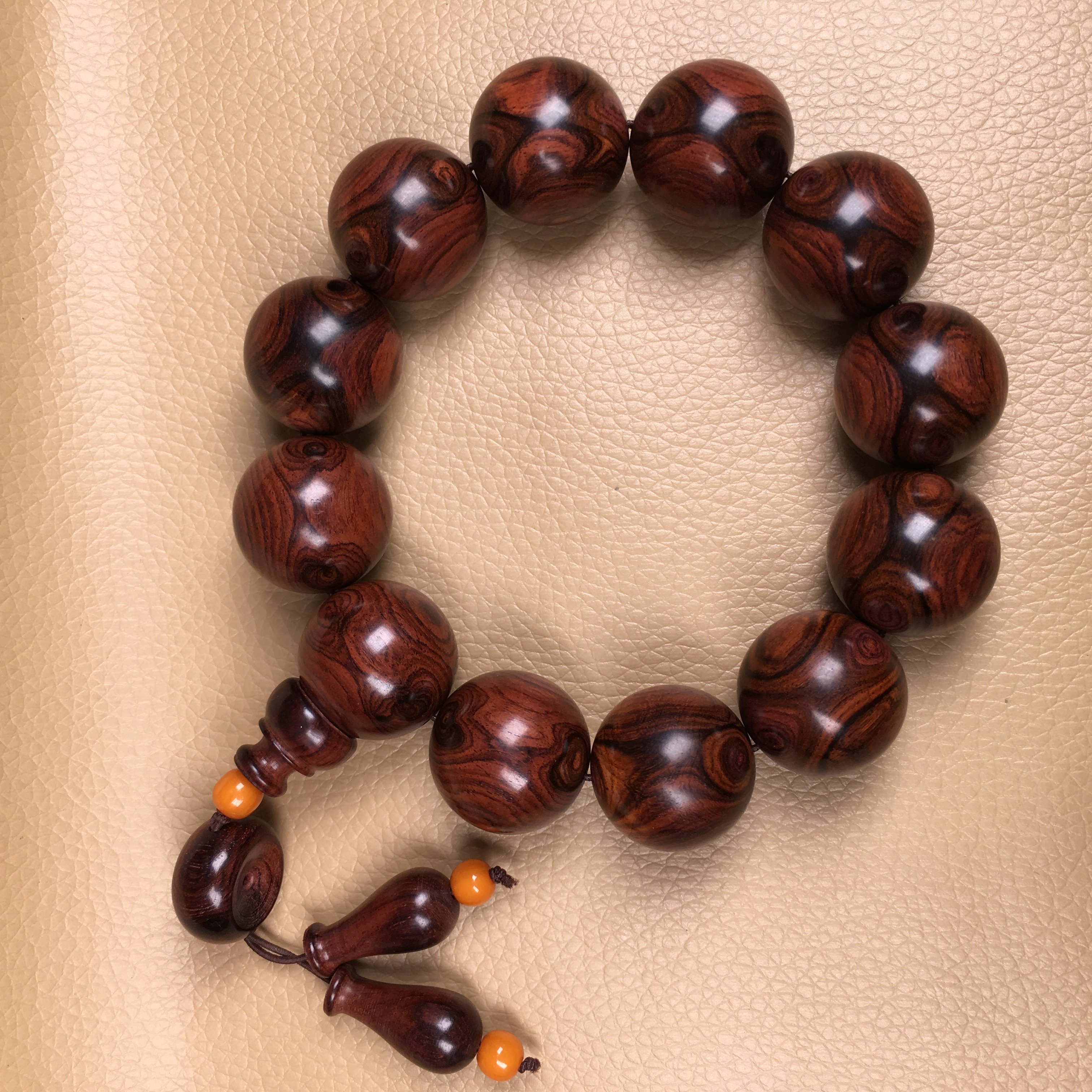 保真海黄家海南黄花梨鬼眼精品收藏孤品紫油梨料佛珠