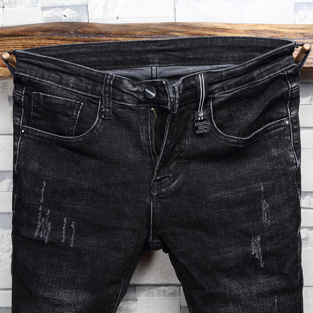 Autumn black shaved and washed distressed old jeans men's youth Korean version of the trend of slim and thin all-match pants Autumn black shaved and washed distressed old jeans men's youth Korean version of the trend of slim and thin all-match pants