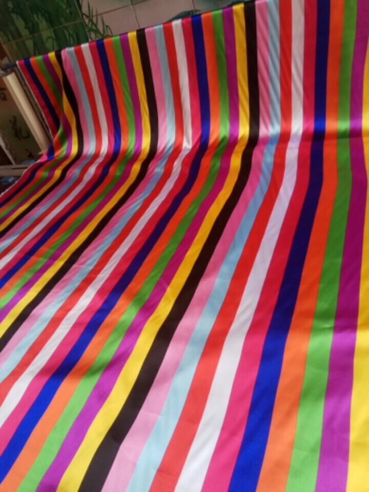 布料新款彩虹条油丁料七彩条色丁贡缎演出服民族服装布面料