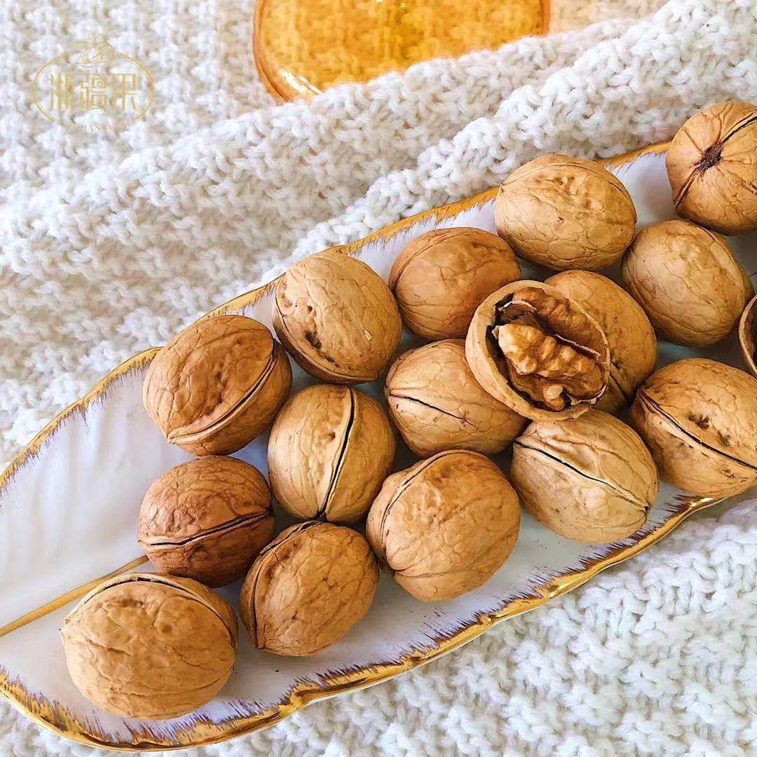 浙疆果新疆纸皮核桃薄皮2021新货阿克苏185薄壳手剥孕妇坚果礼盒