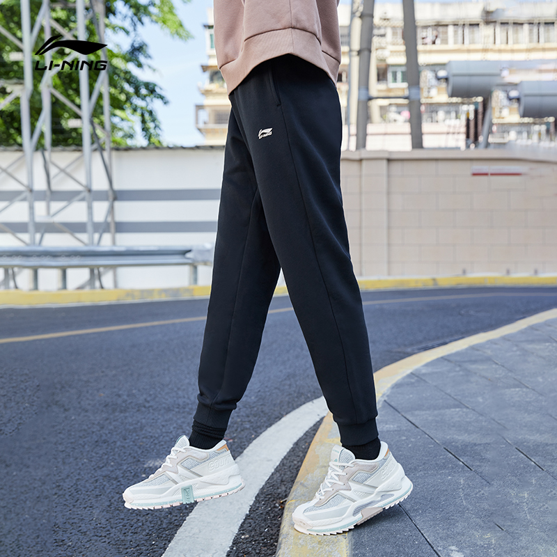 李宁卫裤女士春季时尚裤子束口小脚棉感休闲运动长裤黑色女休闲裤