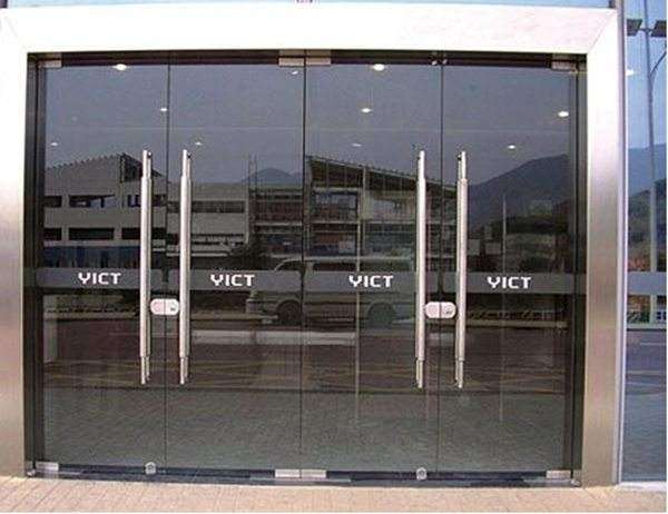 南京地弹门玻璃门肯德基不锈钢包边钢化弹簧公司大门地弹簧