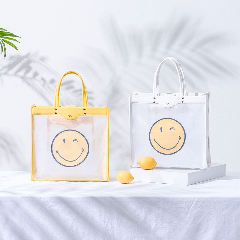 2018夏季新韩版潮流单肩手提斜挎女士大包时尚网纱透明安雅笑脸包
