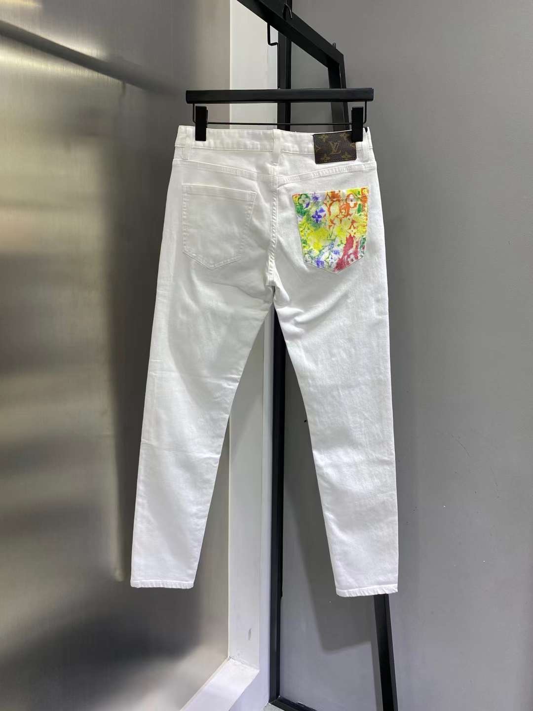 欧美时尚潮牌2021夏季新品男士简约小花白色百搭修身个性牛仔长裤