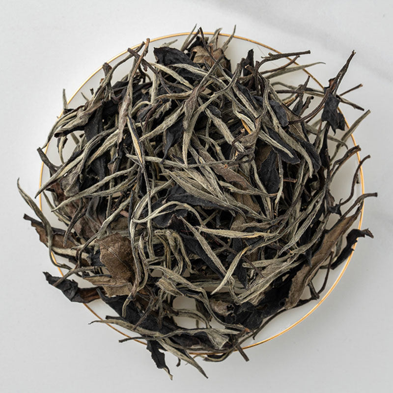 七彩云南庆沣祥高山紫鹃白茶云南大叶种金汤莹润紫光白100g罐