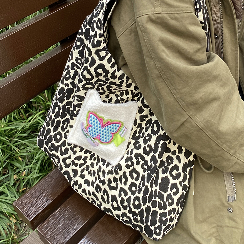 懦夫救星星原创复古豹纹小众帆布包包大容量斜挎双面单肩包托特包