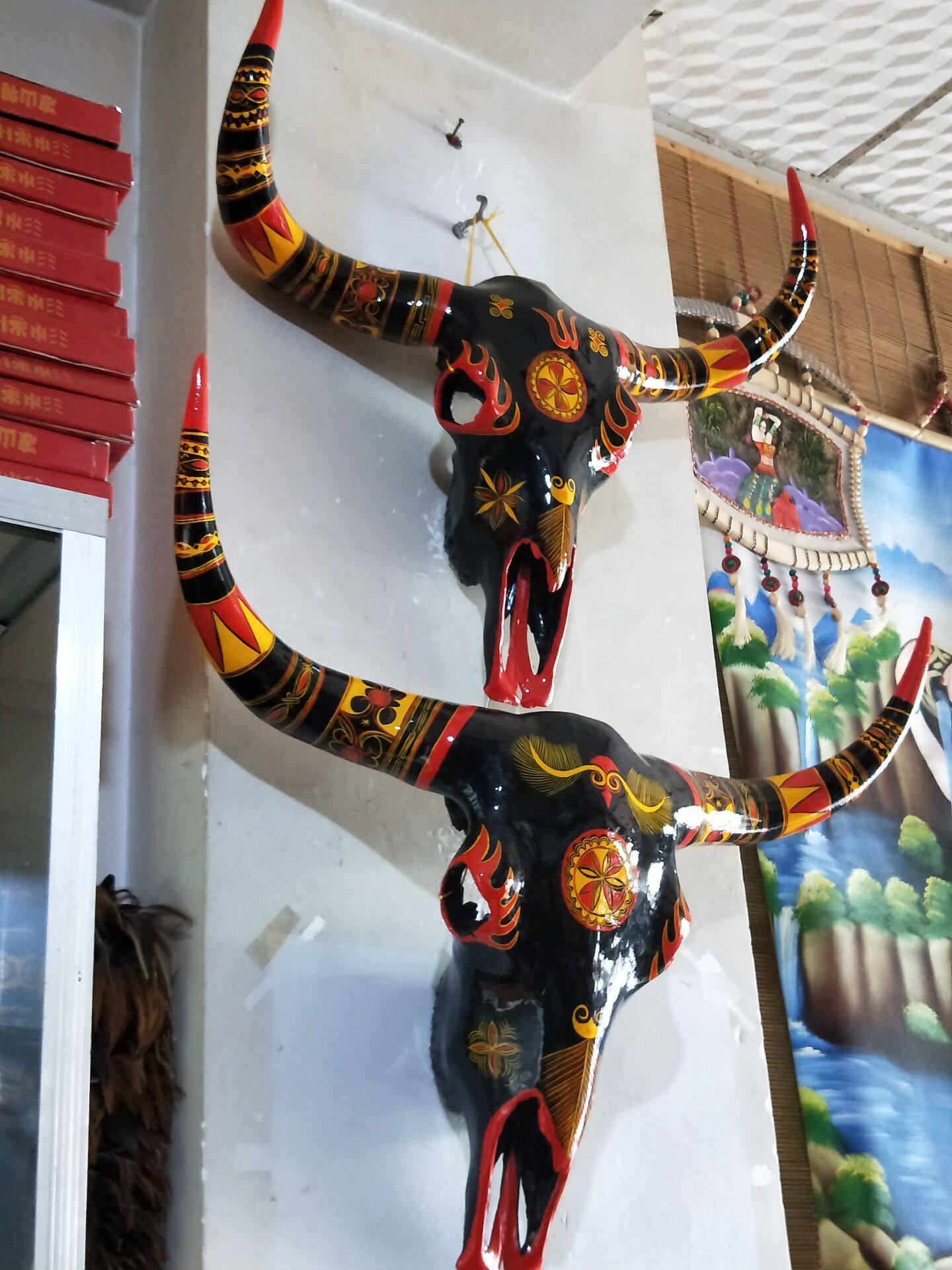 凉山彝族民族特色漆器红黄牦牛牛头骨骼装饰品漆器