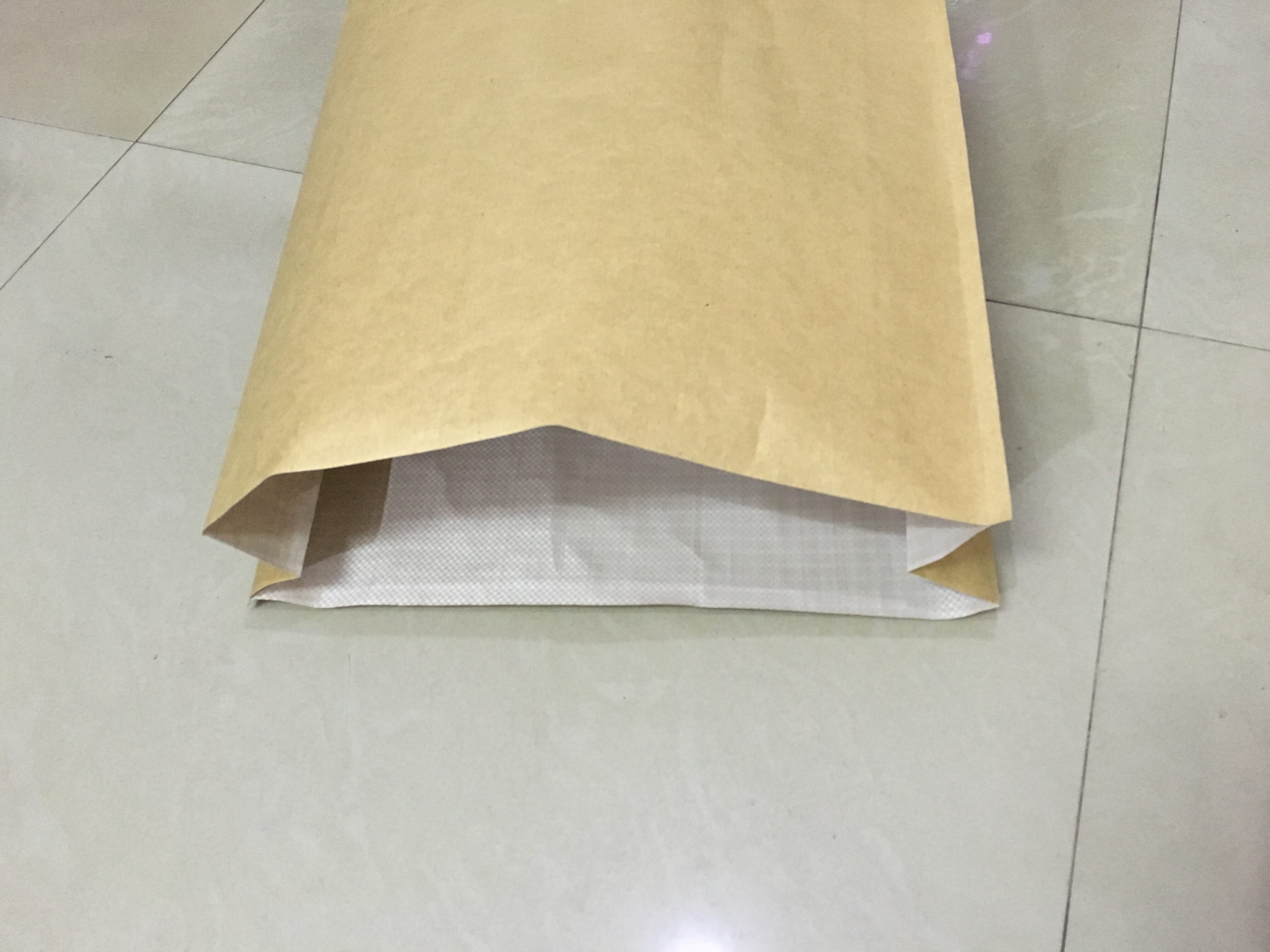 现货加厚牛皮纸编织袋纸塑复合防水防潮袋蛇皮袋快递专用包装袋