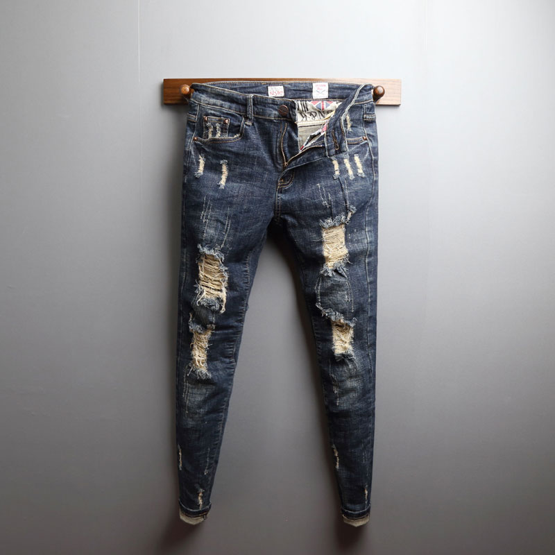 春季新款蓝色做旧破洞猫须乞丐修身牛仔长裤 男 青年百搭小脚裤潮
