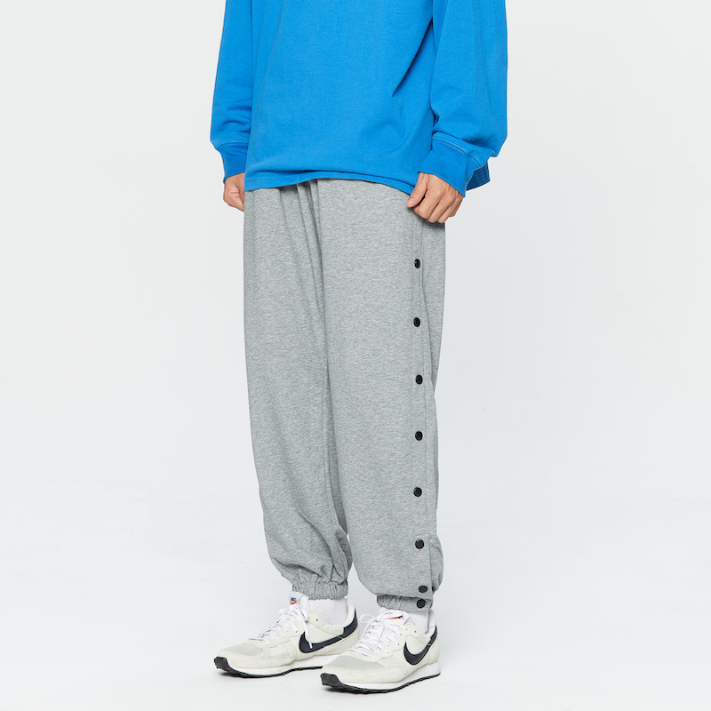 国潮春季针织纽扣裤排扣运动长裤新款欧美高街休闲潮流宽松束脚裤