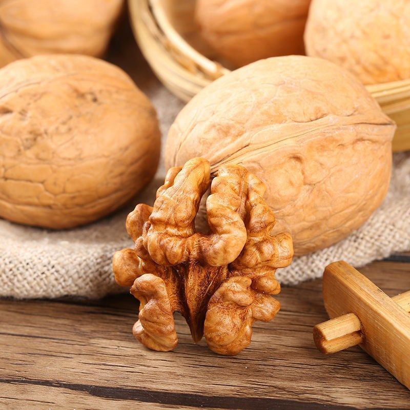 新货新疆核桃1斤夹子大黑黑桃孕妇坚果薄皮纸皮