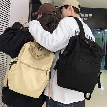 Backpack ແມ່ຍິງຮົງກົງແບບ Retro ໂຮງຮຽນ Bag ຍີ່ປຸ່ນ Casual Solid Color ໂຮງຮຽນສູງນັກສຶກສາ Versatile Backpack Men's Canvas Handbag