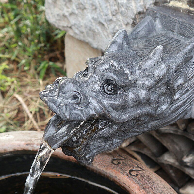 石雕浮雕喷水水龙头摆件假山流水庭院墙壁园林景观石雕