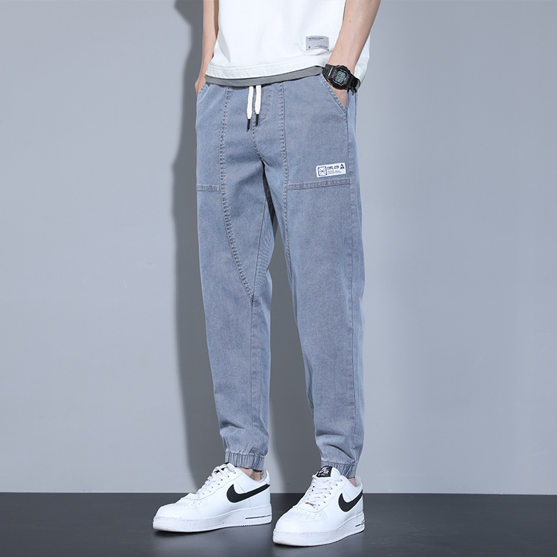 潮牌薄牛仔裤男夏季2022新款贴标拼接宽松潮流束脚直筒九分休闲裤
